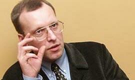 N. Puteikis - ant dviejų kėdžių