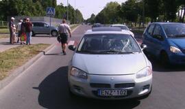 Mergina partrenkta pėsčiųjų perėjoje