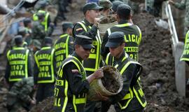 Gelbėtojai Kolumbijoje po nuošliauža rado 30 žmonių kūnus