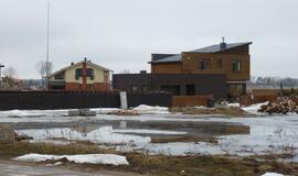 Slengiškių namus apsėmė atlydžio vanduo