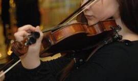 Rekordas: Taivane vienu metu smuiku griežė per 4 tūkst. 600 moksleivių