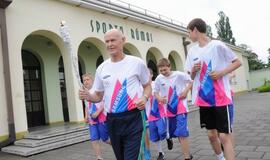 Olimpinė ugnis palydėta į kelionę