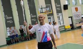 Olimpinė ugnis palydėta į kelionę