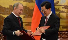 Vladimiras Putinas su Kinijos prezidentu pasirašė 17 svarbių susitarimų