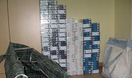 Šilutėje sulaikytas kontrabandines cigaretes nešęs taksistas