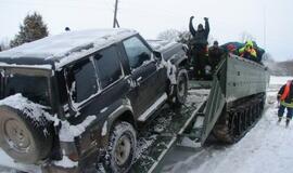 Potvynis įdarbino ir karius