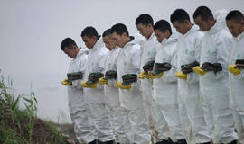 Kinijoje apvirtusio laiko aukų artimieji rengia protestą