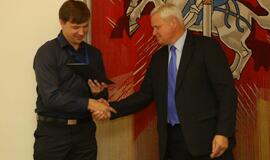 Savanorių apdovanojimas pas Merą