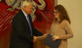 Savanorių apdovanojimas pas Merą