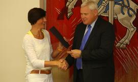 Savanorių apdovanojimas pas Merą