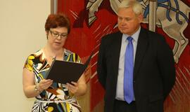 Savanorių apdovanojimas pas Merą