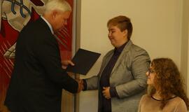 Savanorių apdovanojimas pas Merą