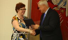 Savanorių apdovanojimas pas Merą