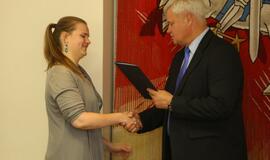 Savanorių apdovanojimas pas Merą