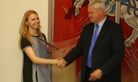 Savanorių apdovanojimas pas Merą