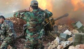 Sirijos armija ir Rusijos lėktuvai nusitaikė į sukilėlius Homso apylinkėse