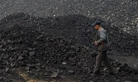 Per gaisrą Kinijos šachtoje žuvo 21 žmogus