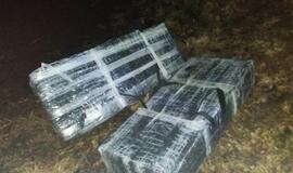 Kontrabandininkai upe plukdė 7 500 pakelių cigarečių