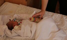 Mažyliams dovanojo tautiečių megztas kojinaites