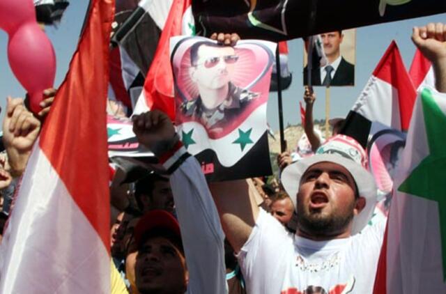 Sirijos TV: žmonės visoje šalyje rengia prezidentą palaikančius mitingus