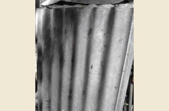 Metė šiferio gabalą ir sužalojo galvą