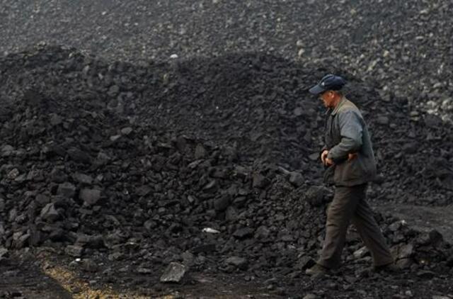 Per gaisrą Kinijos šachtoje žuvo 21 žmogus