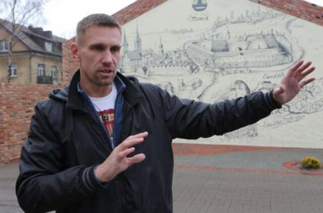 Piešinys ant sienos - duoklė miesto praeičiai